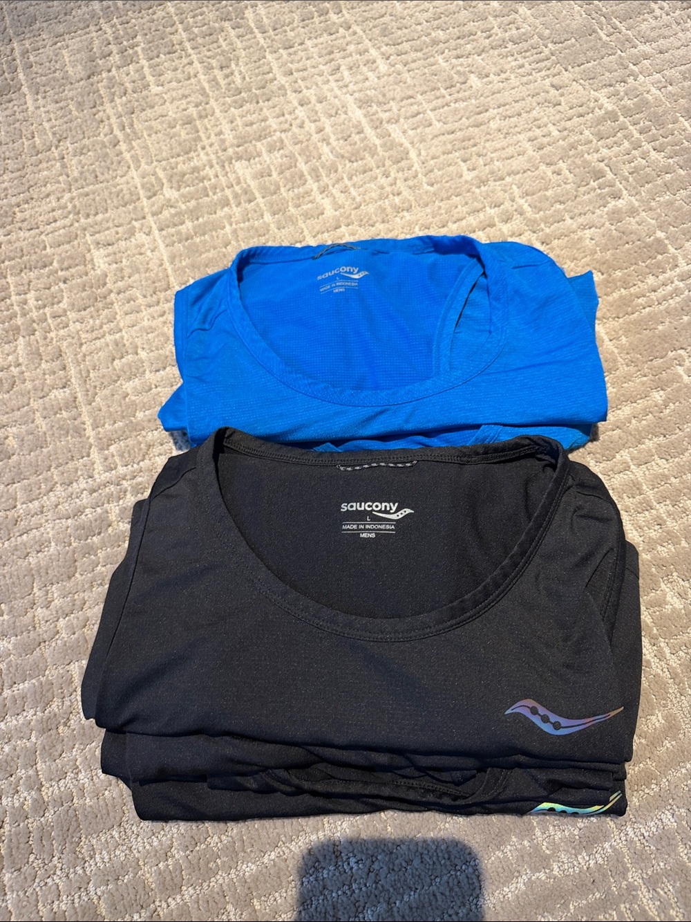 Saucony Black and Bright Blue Performance Tops